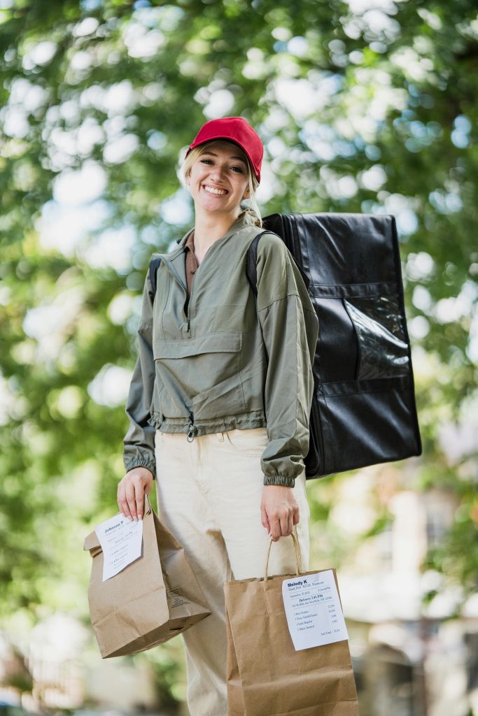 Smiling Woman with Paper Bags